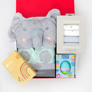 Elephant Parade Bathtime is a cute and very useful gift. The soft, plush hooded towel and classic stack & pour bath egg will delight at bath time, whilst the super soft muslin washers and al.ive hair & body wash will make sure little one is squeaky clean.  This hamper is a suitable gift from newborn up to age 3. All gifts are beautifully presented in our chic, red, signature memory box. $125.00